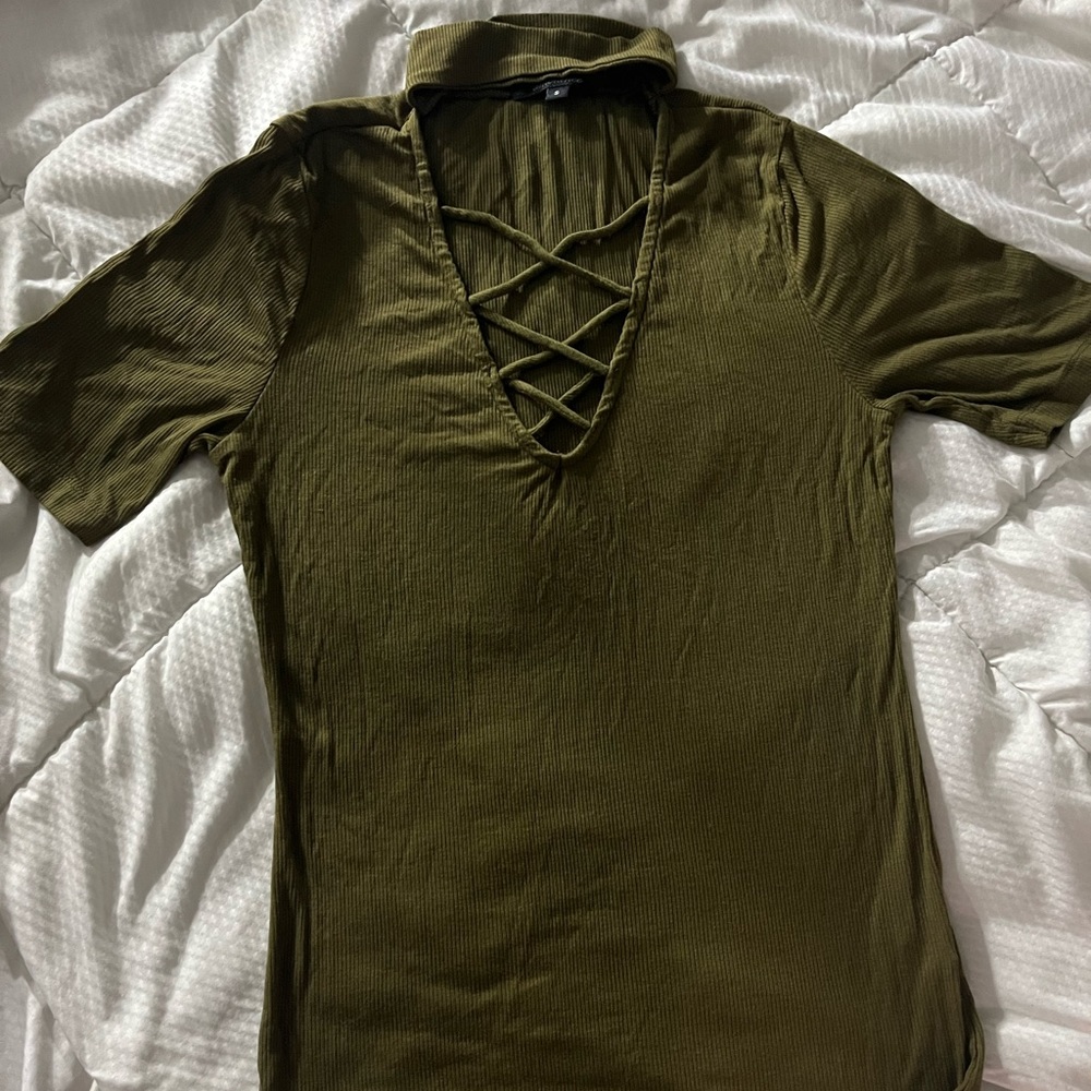 Woman’s small green top